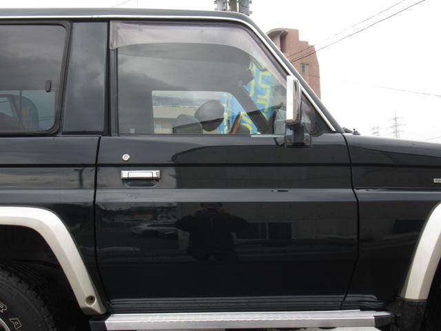 ランドクルーザー70 LXショートナローボディー 5速マニュアル 前後リーフ型 マニュアルハブ メッキバンパー 社外15インチアルミホイール ヨコハマジオランダーA/T・S 純正ダークグリーン色 ケンウッドSDナビ フルセグテレビ Bluetooth(24枚目)