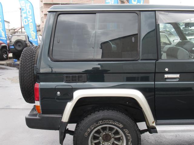 ランドクルーザー70 LXショートナローボディー 5速マニュアル 前後リーフ型 マニュアルハブ メッキバンパー 社外15インチアルミホイール ヨコハマジオランダーA/T・S 純正ダークグリーン色 ケンウッドSDナビ フルセグテレビ Bluetooth(25枚目)