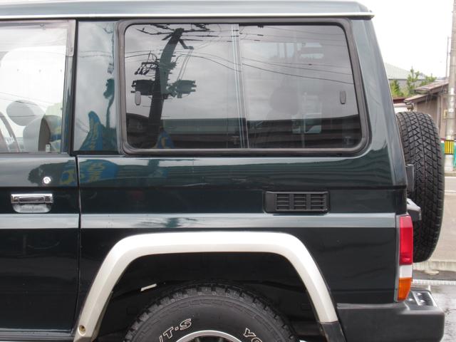 ランドクルーザー70 LXショートナローボディー 5速マニュアル 前後リーフ型 マニュアルハブ メッキバンパー 社外15インチアルミホイール ヨコハマジオランダーA/T・S 純正ダークグリーン色 ケンウッドSDナビ フルセグテレビ Bluetooth(27枚目)