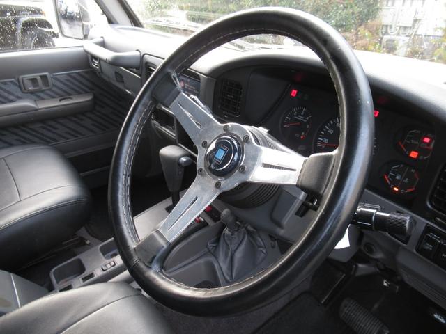 ランドクルーザープラド ＳＸワイドクラシックコンプリートナローボディーリフトアップ　ディーゼルターボ　トヨタ輸出ホイール　トーヨーオープンカントリーＭ／Ｔタイヤ　オレンジコーナーレンズ　オレンジウィンカー　ナルディステアリング　ブラックシートカバー（33枚目）