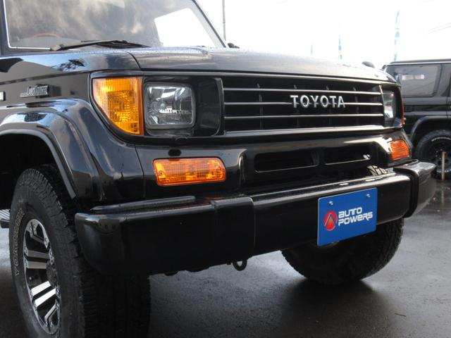 ランドクルーザープラド ＳＸワイド最終後期型　リフトアップ　社外１５インチアルミ　ヨコハマジオランダーＡ／Ｔタイヤ　クリスタルヘッドライト　新品オレンジコーナー　新品オレンジウインカー　ケンウッドＳＤナビ　地デジテレビ　Ｂｌｕｅｔｏｏｔｈ付（22枚目）