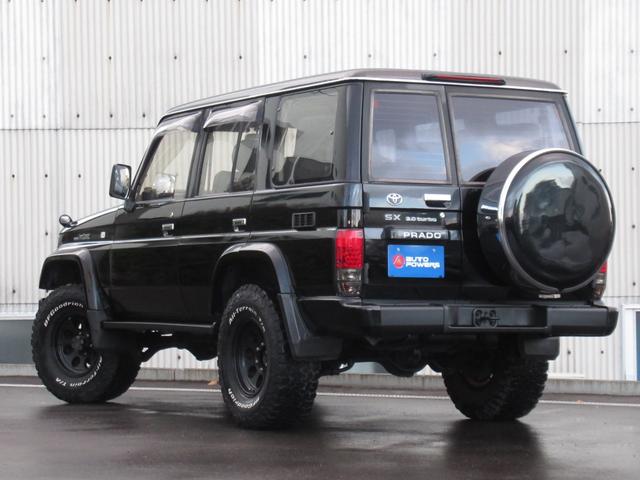 ランドクルーザープラド ＳＸワイド　リフトアップ　ジムライン１６インチホイール　ＢＦグッドリッチオールテレーンタイヤ　トヨタ純正ブラックフロントバンパー　新品スモークヘッドライト　新品オレンジコーナー　新品オレンジウインカ　ＬＥＤテール（9枚目）