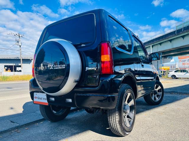 ジムニー クロスアドベンチャーXC マニュアル/4WD車/ハーフレザーシート/社外オーディオ/キーレスキー/純正16インチアルミホイール(10枚目)