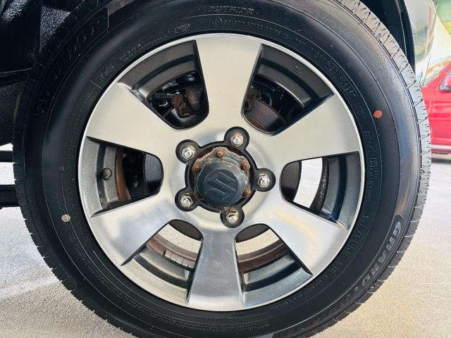 ジムニー クロスアドベンチャーXC マニュアル/4WD車/ハーフレザーシート/社外オーディオ/キーレスキー/純正16インチアルミホイール(20枚目)