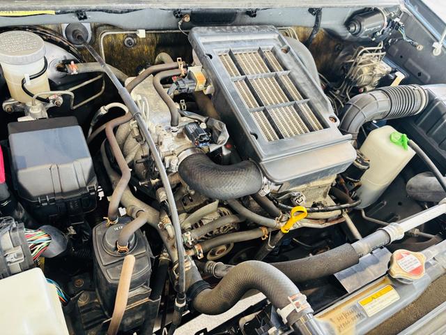 ジムニー クロスアドベンチャーXC マニュアル/4WD車/ハーフレザーシート/社外オーディオ/キーレスキー/純正16インチアルミホイール(23枚目)