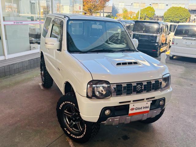 ジムニー クロスアドベンチャー 4WD/ターボ車両/マニュアル/リフトアップ/Bluetooth対応社外ナビTV/バックカメラ/シートヒーター/カスタムシフトレバー/マッドタイヤ装着/LEDフォグランプ/純正16インチアルミホイール(4枚目)