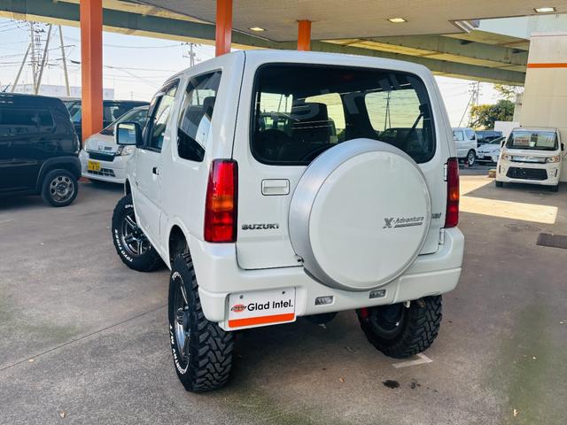ジムニー クロスアドベンチャー 4WD/ターボ車両/マニュアル/リフトアップ/Bluetooth対応社外ナビTV/バックカメラ/シートヒーター/カスタムシフトレバー/マッドタイヤ装着/LEDフォグランプ/純正16インチアルミホイール(5枚目)
