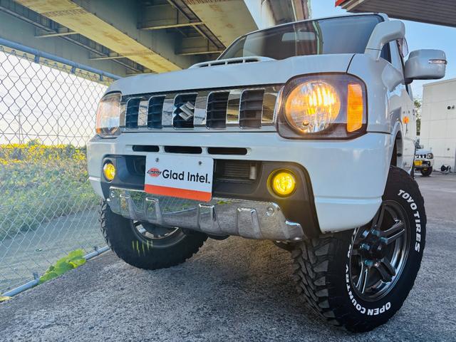 ジムニー クロスアドベンチャー 4WD/ターボ車両/マニュアル/リフトアップ/Bluetooth対応社外ナビTV/バックカメラ/シートヒーター/カスタムシフトレバー/マッドタイヤ装着/LEDフォグランプ/純正16インチアルミホイール(7枚目)