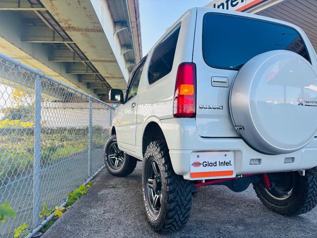 ジムニー クロスアドベンチャー 4WD/ターボ車両/マニュアル/リフトアップ/Bluetooth対応社外ナビTV/バックカメラ/シートヒーター/カスタムシフトレバー/マッドタイヤ装着/LEDフォグランプ/純正16インチアルミホイール(9枚目)