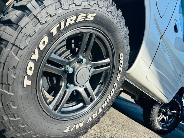ジムニー クロスアドベンチャー 4WD/ターボ車両/マニュアル/リフトアップ/Bluetooth対応社外ナビTV/バックカメラ/シートヒーター/カスタムシフトレバー/マッドタイヤ装着/LEDフォグランプ/純正16インチアルミホイール(19枚目)