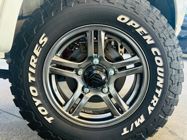 ジムニー クロスアドベンチャー 4WD/ターボ車両/マニュアル/リフトアップ/Bluetooth対応社外ナビTV/バックカメラ/シートヒーター/カスタムシフトレバー/マッドタイヤ装着/LEDフォグランプ/純正16インチアルミホイール(20枚目)