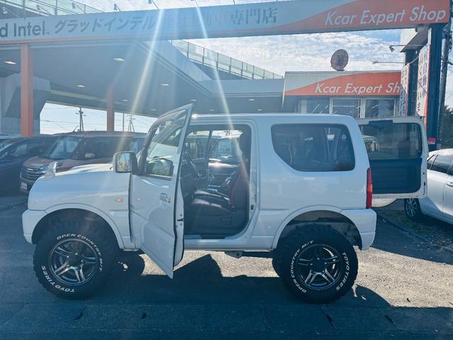 ジムニー クロスアドベンチャー 4WD/ターボ車両/マニュアル/リフトアップ/Bluetooth対応社外ナビTV/バックカメラ/シートヒーター/カスタムシフトレバー/マッドタイヤ装着/LEDフォグランプ/純正16インチアルミホイール(25枚目)