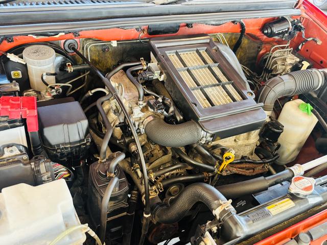 ジムニー クロスアドベンチャーXC マニュアル車/4WD/専用レザーシート/USB対応社外オーディオ/シートヒーター/純正16インチアルミホイール(23枚目)