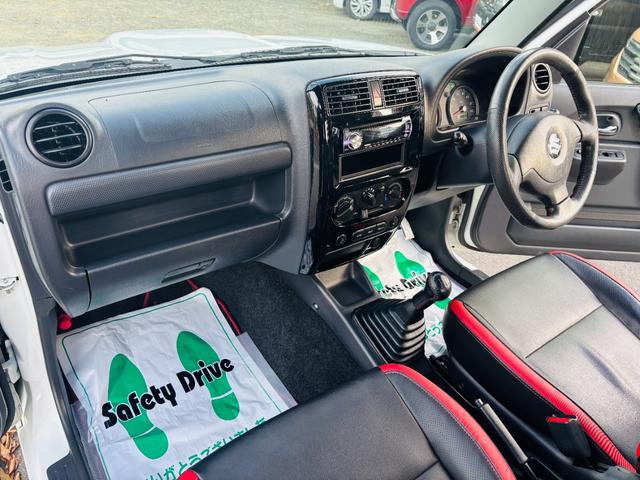 ジムニー クロスアドベンチャー　４ＷＤ／マニュアル車／専用レザー調シート／シートヒーター／社外ＣＤオーディオ／キーレスキー／純正１６インチアルミホイール（12枚目）