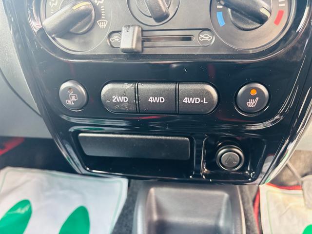 ジムニー クロスアドベンチャー　４ＷＤ／マニュアル車／専用レザー調シート／シートヒーター／社外ＣＤオーディオ／キーレスキー／純正１６インチアルミホイール（22枚目）