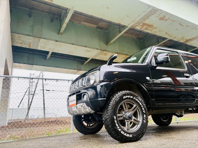 ジムニー クロスアドベンチャー　４ＷＤ／ターボ車／後期型／リフトアップ／マッドタイヤ装着車／キーレスキー／社外ＣＤオーディオ／純正１６インチアルミホイール（7枚目）