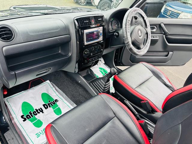 ジムニー クロスアドベンチャー　４ＷＤ／ターボ車／後期型／リフトアップ／マッドタイヤ装着車／キーレスキー／社外ＣＤオーディオ／純正１６インチアルミホイール（12枚目）