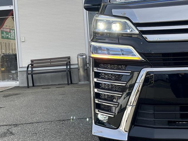 ヴェルファイアハイブリッド Ｚ　禁煙車　４ＷＤ　後期型　レーダークルーズコントロール　衝突軽減サポート　レーンアシスト　コーナーセンサー　純正１０インチナビ【ＨＤＭＩ】バックカメラ　両側電動スライドドア　フリップダウンモニター（54枚目）