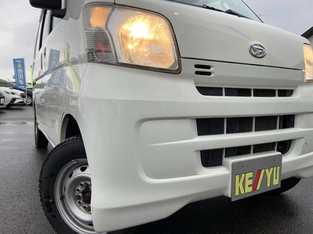 ハイゼットカーゴ スペシャルクリーン　禁煙車　パートタイム４ＷＤ　夏・冬タイヤセット　両側手動スライドドア　ヘッドライトレベライザー　保証書　スペアキー　取扱説明書　パワーステアリング　ＡＢＳ　Ｗエアバック（35枚目）
