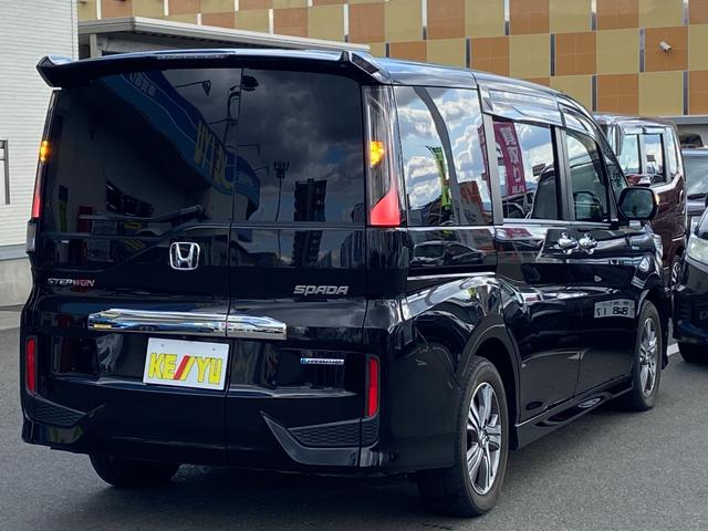 ステップワゴンスパーダ スパーダハイブリッド　Ｇ・ＥＸ　ホンダセンシング　禁煙車　衝突被害軽減装置　レーンアシスト　レーダークルーズコントロール　両側電動スライドドア　後席モニター　全方位モニター　純正９インチナビ【ＣＤ　ＤＶＤ　フルセグＴＶ　Ｂｌｕｅｔｏｏｔｈ】　ＥＴＣ（4枚目）