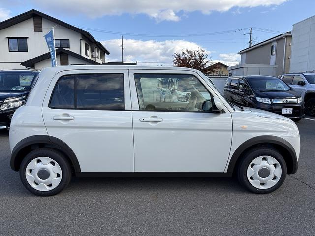 アルトラパンLC L 届け出済み未使用車 レーンアシスト コーナーセンサー バックアイカメラ付きディスプレイオーディオ【USB Bluetooth】 ハーフレザーシート&シートヒーター 衝突被害軽減装置 横滑り防止装置 ステアリングリモコン アイドリングストップ 保証書(11枚目)