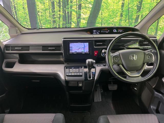 ステップワゴンスパーダ スパーダ　両側電動ドア　禁煙車　スマートキー　ＬＥＤヘッド　ＥＴＣ　クルコン　オートライト　オートエアコン　純正１６インチアルミ　Ｂｌｕｅｔｏｏｔｈ　ＣＤ　ＤＶＤ再生　フルセグ（2枚目）