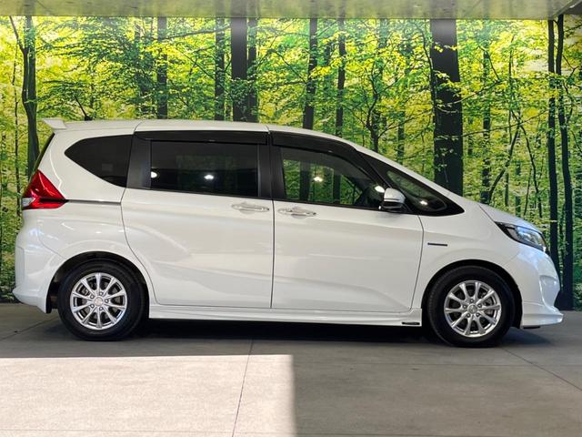 フリードハイブリッド ハイブリッド・Gホンダセンシング 両側電動ドア DVDナビ バックカメラ コーナーセンサー スマートキー LEDヘッド ビルトインETC 車線逸脱警報 オートライト オートエアコン 純正15インチアルミ Bluetooth CD(54枚目)