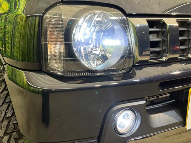 ジムニー ランドベンチャー 4WD SDナビ 禁煙車 ハーフレザーシート 前席シートヒーター LEDヘッド ETC 純正16インチアルミ Bluetooth CD フルセグ キーレス パワーウィンドウ 電動格納ドアミラー(12枚目)
