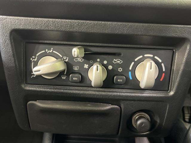 パジェロミニ アクティブフィールドエディション 4WD 純正15インチアルミ CD DVD再生 ナビ 電動格納ミラー プライバシーガラス グレーファブリックコンビシート リアワイパー メッキ加飾付フロントグリル 背面ハードカバー 革巻きステアリング(4枚目)