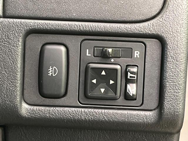 パジェロミニ アクティブフィールドエディション 4WD 純正15インチアルミ CD DVD再生 ナビ 電動格納ミラー プライバシーガラス グレーファブリックコンビシート リアワイパー メッキ加飾付フロントグリル 背面ハードカバー 革巻きステアリング(5枚目)