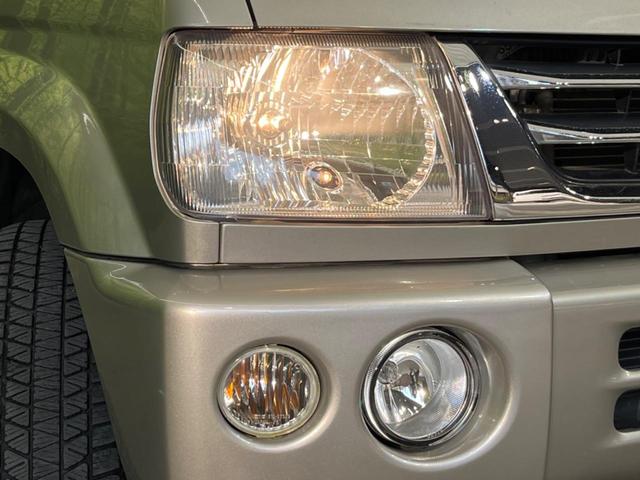 パジェロミニ アクティブフィールドエディション 4WD 純正15インチアルミ CD DVD再生 ナビ 電動格納ミラー プライバシーガラス グレーファブリックコンビシート リアワイパー メッキ加飾付フロントグリル 背面ハードカバー 革巻きステアリング(12枚目)