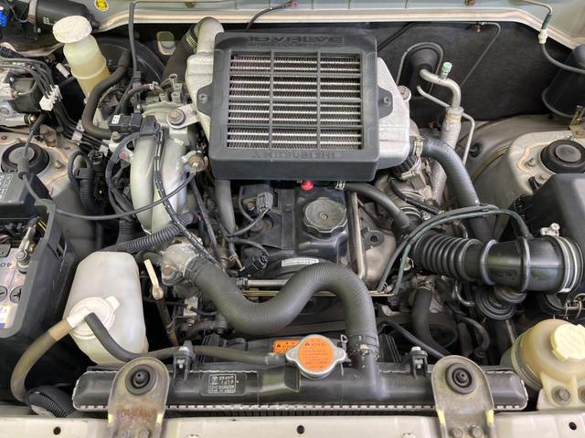 パジェロミニ アクティブフィールドエディション 4WD 純正15インチアルミ CD DVD再生 ナビ 電動格納ミラー プライバシーガラス グレーファブリックコンビシート リアワイパー メッキ加飾付フロントグリル 背面ハードカバー 革巻きステアリング(18枚目)