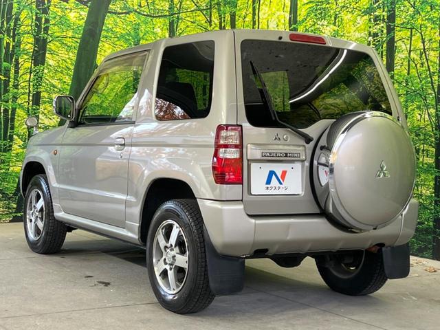 パジェロミニ アクティブフィールドエディション 4WD 純正15インチアルミ CD DVD再生 ナビ 電動格納ミラー プライバシーガラス グレーファブリックコンビシート リアワイパー メッキ加飾付フロントグリル 背面ハードカバー 革巻きステアリング(24枚目)