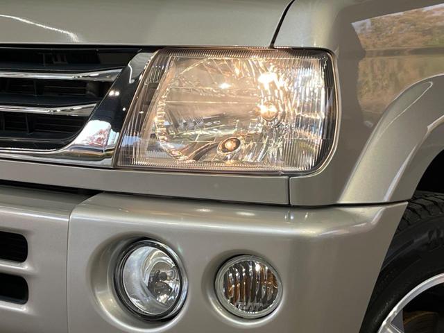 パジェロミニ アクティブフィールドエディション 4WD 純正15インチアルミ CD DVD再生 ナビ 電動格納ミラー プライバシーガラス グレーファブリックコンビシート リアワイパー メッキ加飾付フロントグリル 背面ハードカバー 革巻きステアリング(25枚目)