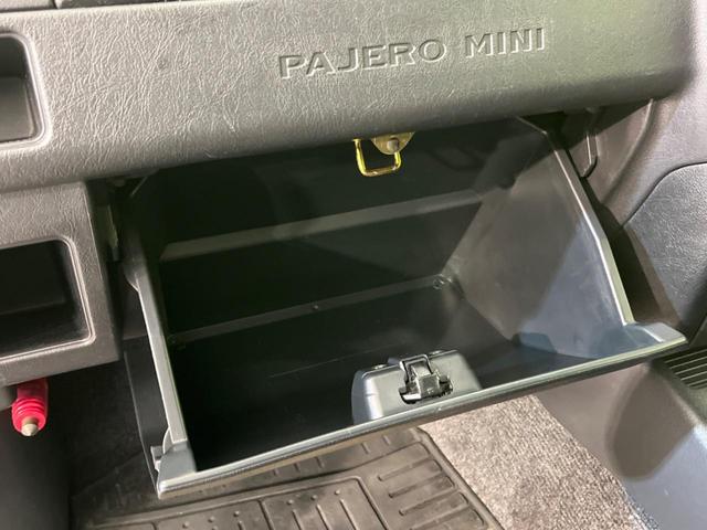 パジェロミニ アクティブフィールドエディション 4WD 純正15インチアルミ CD DVD再生 ナビ 電動格納ミラー プライバシーガラス グレーファブリックコンビシート リアワイパー メッキ加飾付フロントグリル 背面ハードカバー 革巻きステアリング(38枚目)