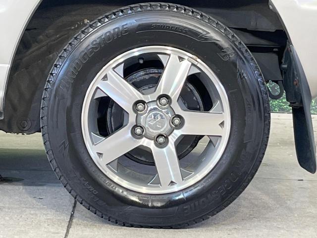 パジェロミニ アクティブフィールドエディション 4WD 純正15インチアルミ CD DVD再生 ナビ 電動格納ミラー プライバシーガラス グレーファブリックコンビシート リアワイパー メッキ加飾付フロントグリル 背面ハードカバー 革巻きステアリング(46枚目)