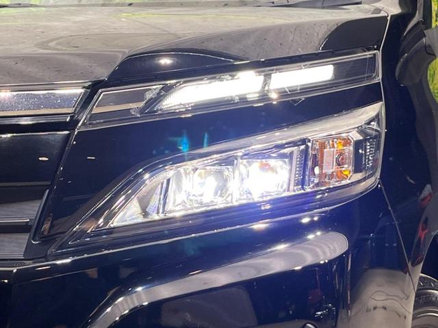 ヴォクシー Ｘ　ＳＤナビ　電動スライドドア　衝突被害軽減システム　禁煙車　ドラレコ　フリップダウン　スマートキー　ＬＥＤヘッド　ＥＴＣ　クルコン　オートハイビーム　オートライト　デュアルエアコン　車線逸脱警報（12枚目）