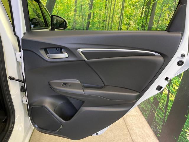 フィットハイブリッド Ｌパッケージ　バックカメラ　衝突被害軽減システム　禁煙車　ハーフレザーシート　スマートキー　ＬＥＤヘッド　クルコン　オートライト　オートエアコン　Ｂｌｕｅｔｏｏｔｈ　ＣＤ　ＤＶＤ再生　地デジ　電動格納ミラー（29枚目）