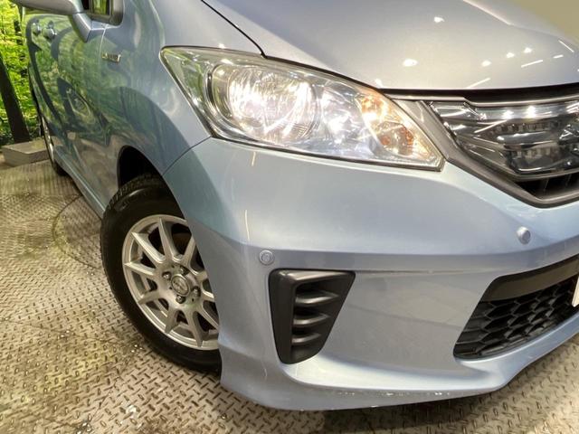 ジャストセレクション 禁煙車 両側電動スライドドア 純正ナビ バックカメラ ドライブレコーダー クルーズコントロール HIDヘッドライト 革巻きステアリング ハーフレザーシート スマートキー オートエアコン オートライト(55枚目)