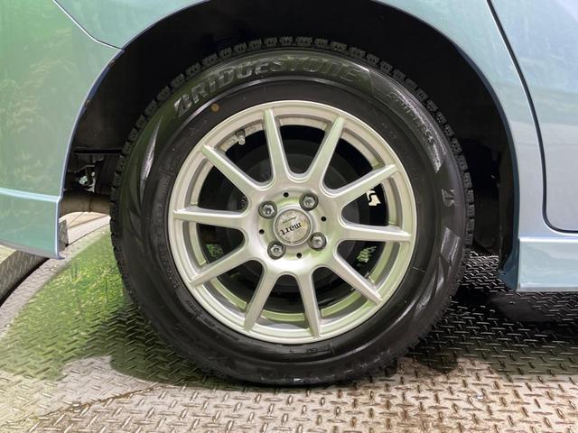 ジャストセレクション 禁煙車 両側電動スライドドア 純正ナビ バックカメラ ドライブレコーダー クルーズコントロール HIDヘッドライト 革巻きステアリング ハーフレザーシート スマートキー オートエアコン オートライト(57枚目)