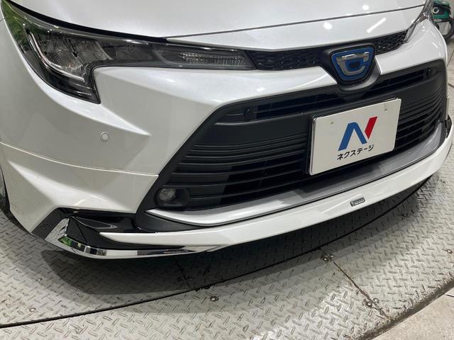 カローラツーリング ハイブリッド G モデリスタエアロ 純正10.5型ナビ バックカメラ ブラインドスポットモニター パーキングサポートブレーキ セーフティセンス レーダークルーズ LEDヘッド スマートキー ETC 革巻きステアリング(3枚目)