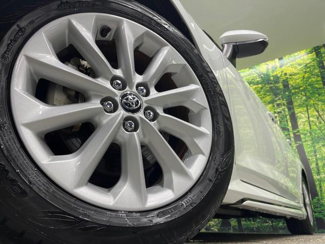 カローラツーリング ハイブリッド G モデリスタエアロ 純正10.5型ナビ バックカメラ ブラインドスポットモニター パーキングサポートブレーキ セーフティセンス レーダークルーズ LEDヘッド スマートキー ETC 革巻きステアリング(13枚目)