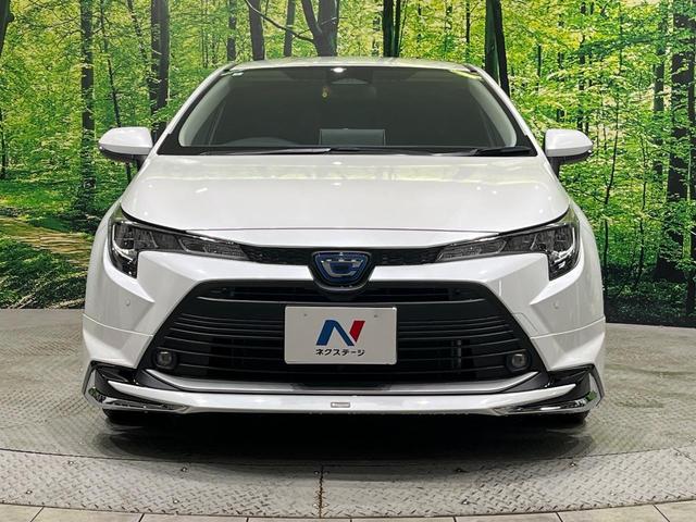 カローラツーリング ハイブリッド G モデリスタエアロ 純正10.5型ナビ バックカメラ ブラインドスポットモニター パーキングサポートブレーキ セーフティセンス レーダークルーズ LEDヘッド スマートキー ETC 革巻きステアリング(14枚目)