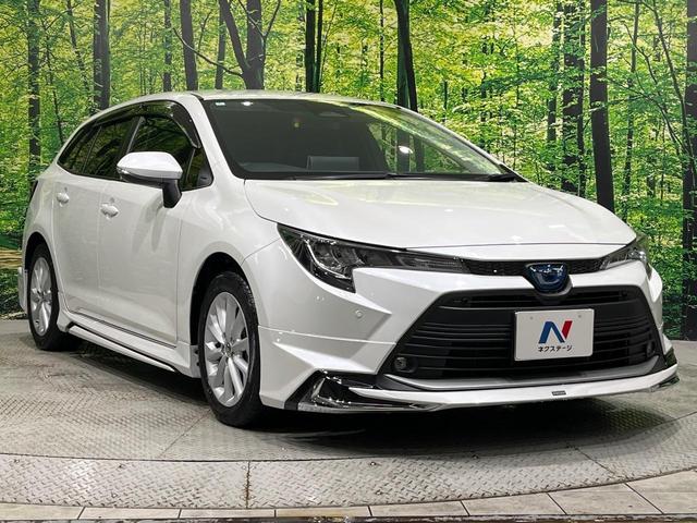 カローラツーリング ハイブリッド G モデリスタエアロ 純正10.5型ナビ バックカメラ ブラインドスポットモニター パーキングサポートブレーキ セーフティセンス レーダークルーズ LEDヘッド スマートキー ETC 革巻きステアリング(16枚目)