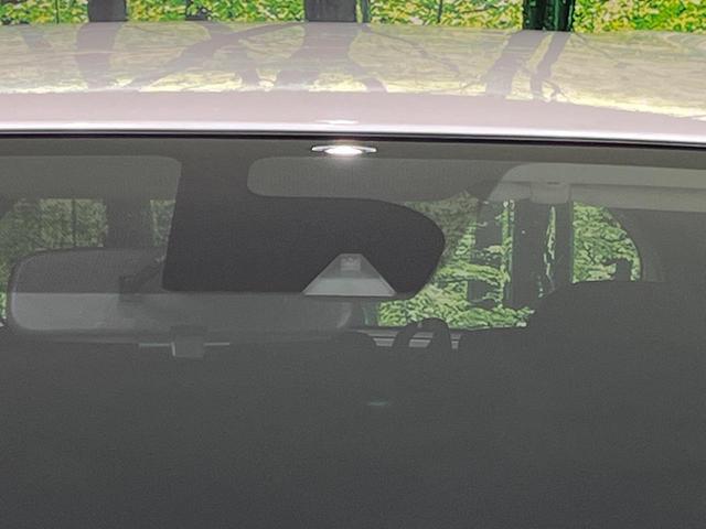 ノート X 後期 純正SDナビ エマージェンシーブレーキ アイドリングストップ インテリキー オートライト シートリフター ステアリングスイッチ プライバシーガラス 電動格納ミラー エアコン 車線逸脱警報 禁煙車(4枚目)