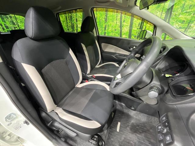 ノート X 後期 純正SDナビ エマージェンシーブレーキ アイドリングストップ インテリキー オートライト シートリフター ステアリングスイッチ プライバシーガラス 電動格納ミラー エアコン 車線逸脱警報 禁煙車(8枚目)