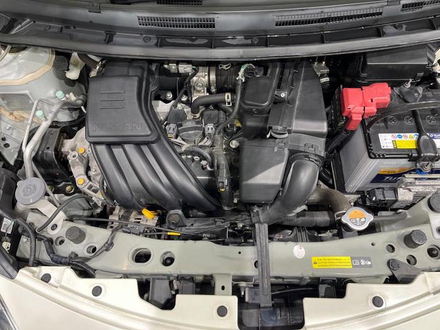 ノート X 後期 純正SDナビ エマージェンシーブレーキ アイドリングストップ インテリキー オートライト シートリフター ステアリングスイッチ プライバシーガラス 電動格納ミラー エアコン 車線逸脱警報 禁煙車(18枚目)