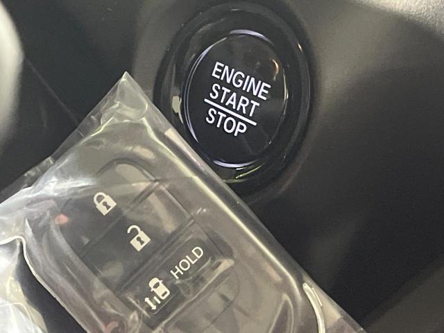 N-BOX ベースグレード 届出済未使用車 ホンダセンシング アダプティブクルーズ 電動スライドドア スマートキー LEDヘッド オートライト シートヒーター オートエアコン アームレスト シートリフター 充電用USBタイプC(7枚目)