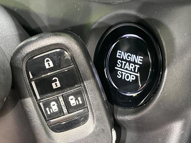 N-BOXカスタム ベースグレード 純正8型ナビ フルセグ バックカメラ ETC ホンダセンシング アダプティブクルーズ 両側電動スライドドア LEDヘッドライト オートライト シートヒーター スマートキー 禁煙車 ステアリングスイッチ(35枚目)