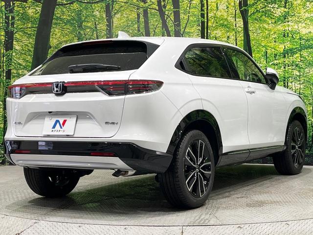 ヴェゼル ｅ：ＨＥＶ　Ｚ　登録済未使用車　９型コネクトナビ　マルチビューカメラ　ハンズフリーパワーバックドア　ホンダセンシング　アダプティブクルーズ　ブラインドスポットモニター　ＬＥＤヘッド　シーケンシャルターン　スマートキー（17枚目）